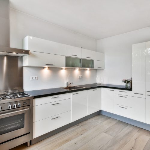 A modern kitchen interior in white colors